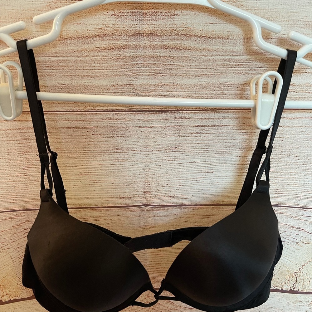 Victoria’s Secret bra size 34B. Black push-up.